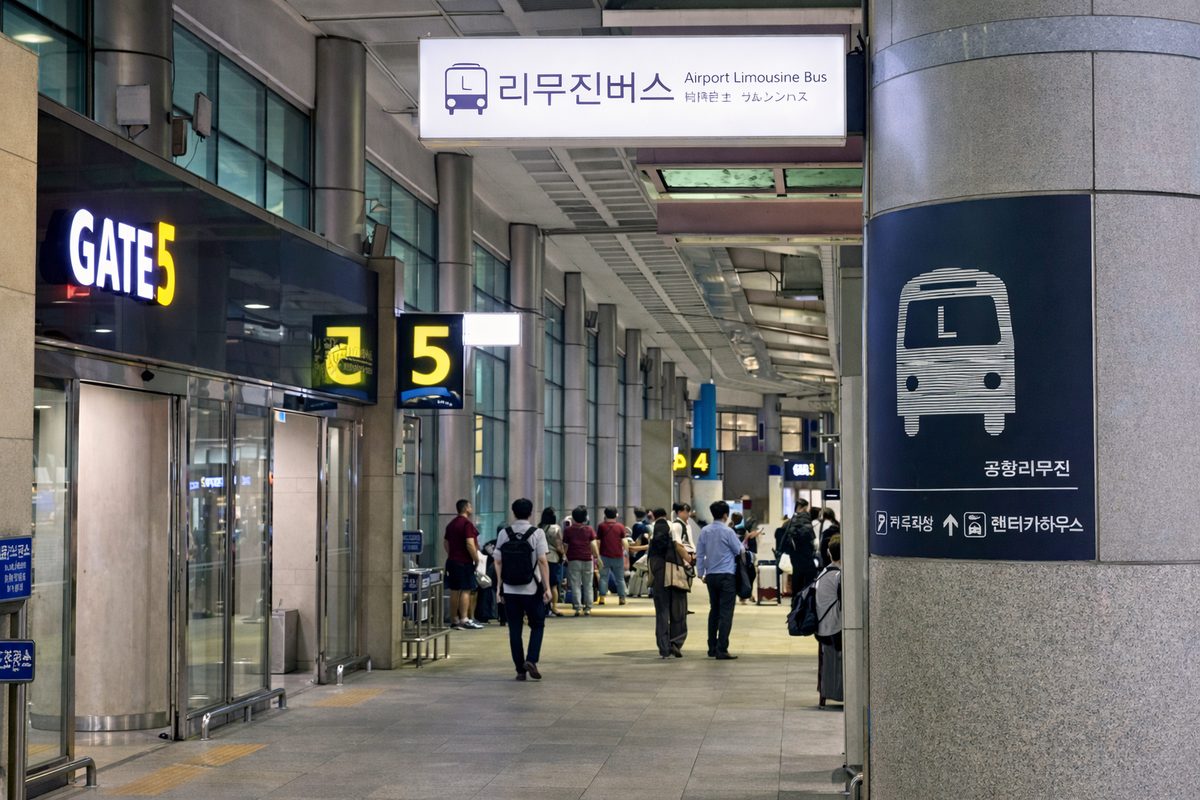 Airport Limousine Bus sign above Gate 5