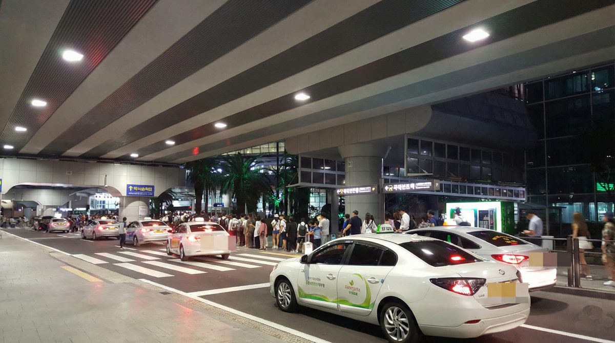 Taxi rank outside Gate 3 at Jeju International Airport